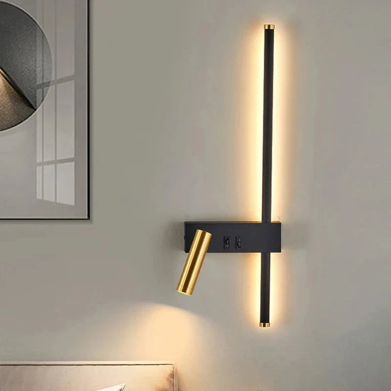 Applique Veillée lumineuse sur un mur près d’un chevet.