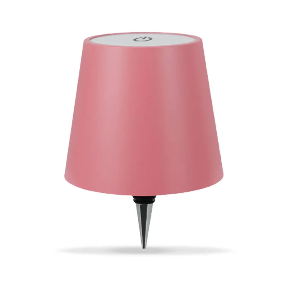 Lampe pour bouteille Vinea rose isolée sur fond blanc.