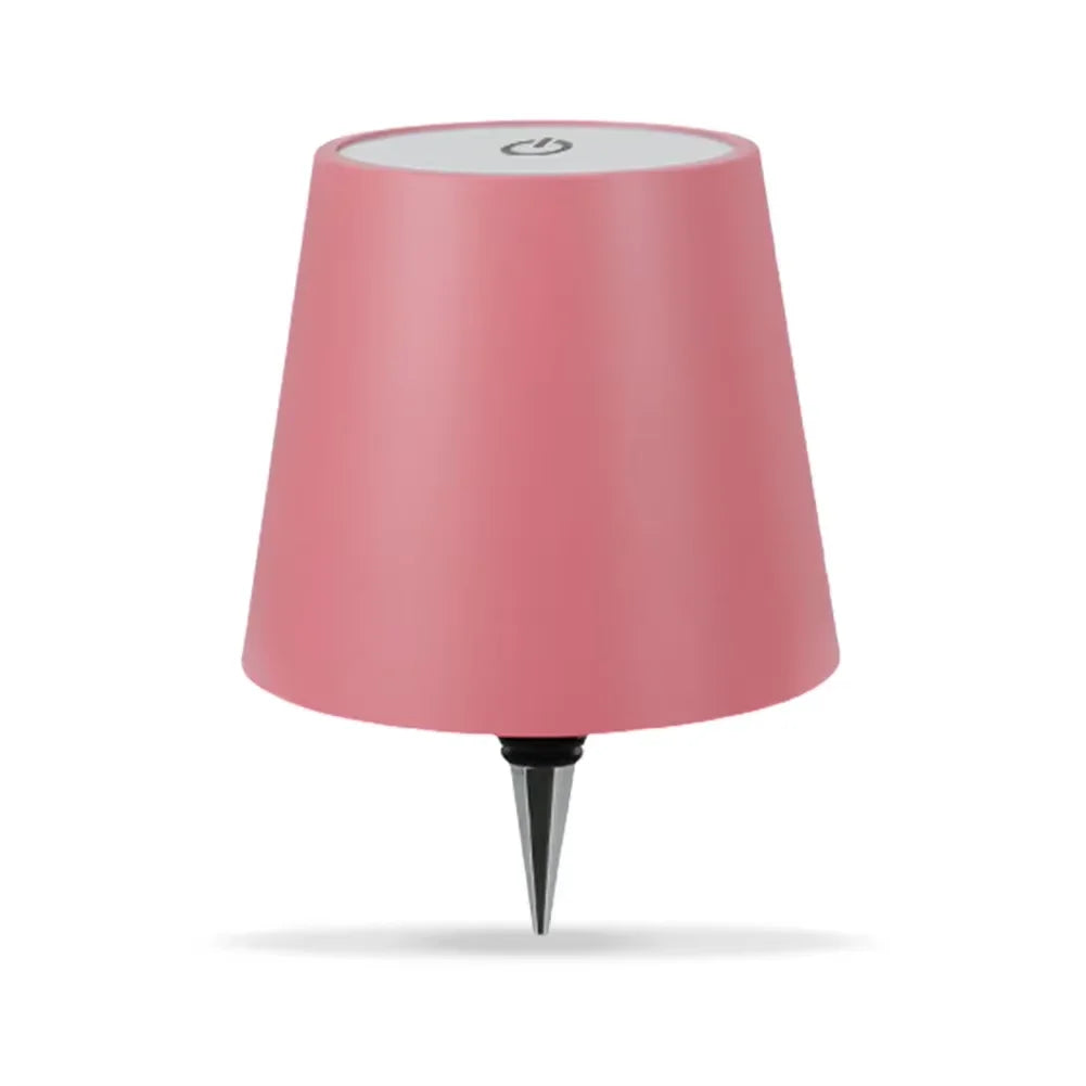 Lampe pour bouteille Vinea rose, vue de face sur fond blanc.