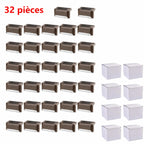 Montage de lampes Rivage brunes et de boîtes blanches avec la mention 32 pièces.