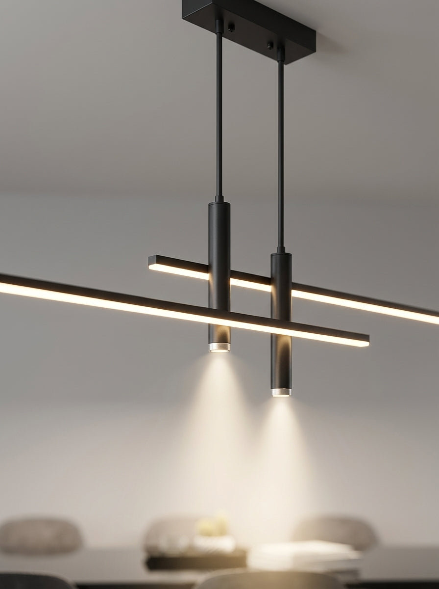 Suspension Linéva Noir Charbon allumée, avec vue sur les câbles et la fixation au plafond.