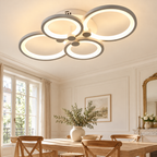 Plafonnier gris argent à quatre anneaux dans un décor repas chene