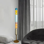 Arlequin — lampadaire de 160 cm en verre coloré dans un salon