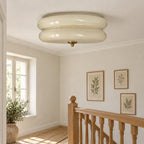 Ciselé beige et doré dans un palier. Décor non fourni.