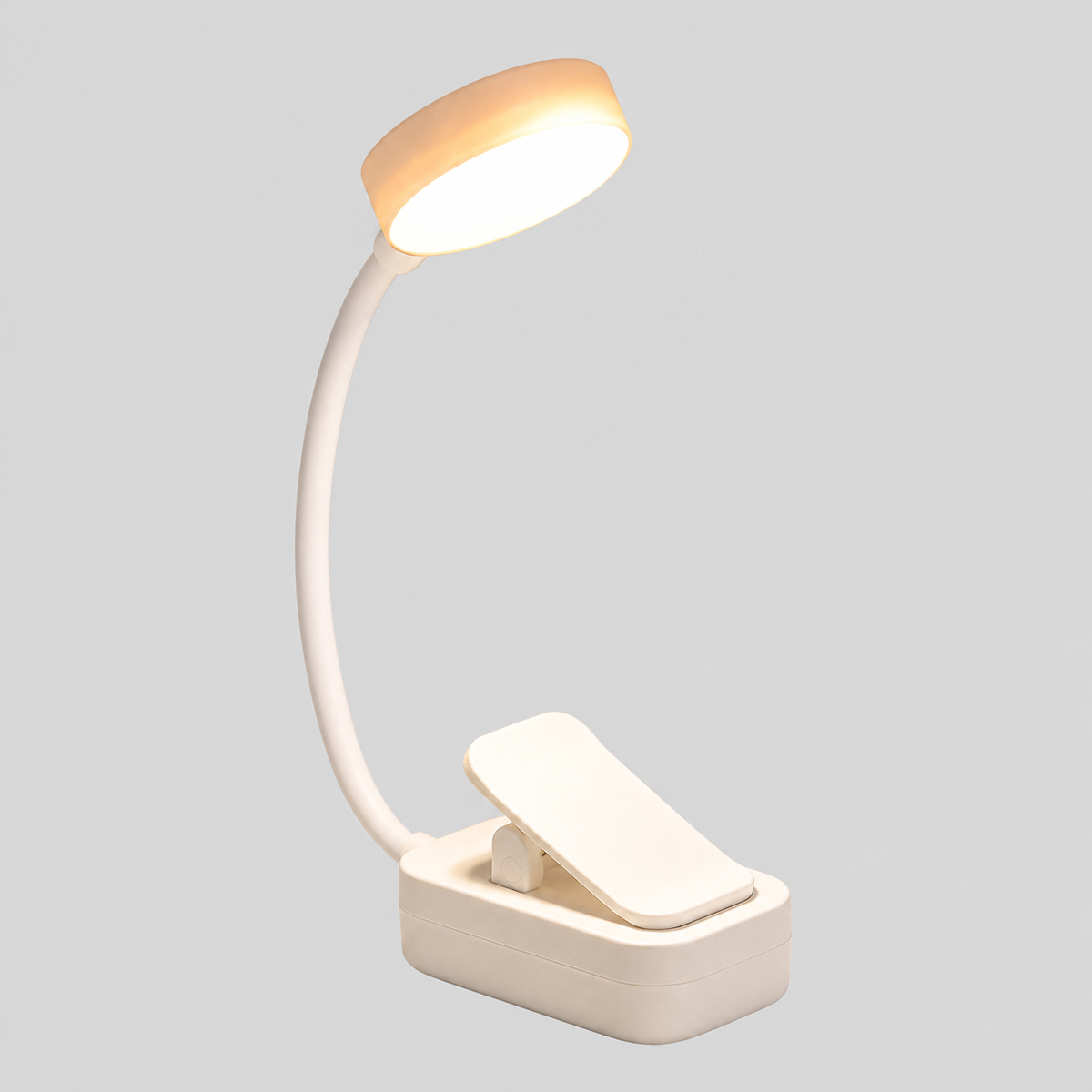 Liseo Mini | Lampe de lecture LED à pince — produit isolé sur fond gris, arrière-plan retouché.