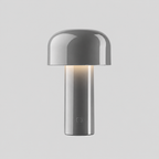 Dôme | Lampe de table nomade — Dôme coloré — produit isolé sur fond gris, arrière-plan retouché.