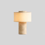 Roche | Lampe nomade en pierre — produit isolé sur fond gris, arrière-plan retouché.