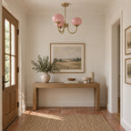 Guimauve éteint dans une entrée avec console en bois. Mise en scène illustrative ; décor non fourni.