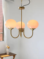 Guimauve trois globes rose, structure dorée, éclairage allumé