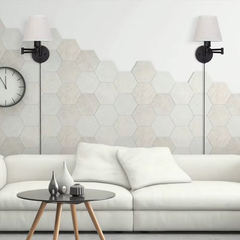 Deux appliques Liorane dans un coin salon clair, visuel fournisseur.