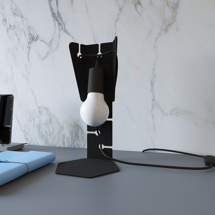 Écritoire Noir — photo fabricant sur bureau, vue frontale ; ampoule et décor non inclus.