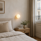 Mise en scène illustrative de l’applique Nacra ronde dans une chambre naturelle