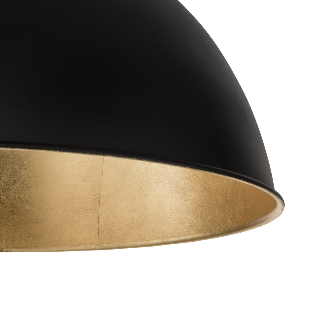 Lampadaire arqué Jonera de Lindby, noir, métal, E27, hauteur 185 cm — détail de la finition dorée — photo fabricant