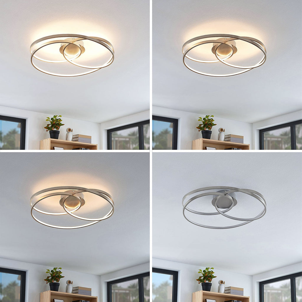 Plafonnier LED Lindby Joline, Ø 60 cm, couleur nickel, métal — présentation des niveaux d’éclairage — photo fabricant