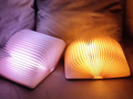Lampes livre ouvertes, pages lumineuses