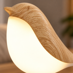 oiseau — aspect bois clair et diffuseur blanc, détail rapproché