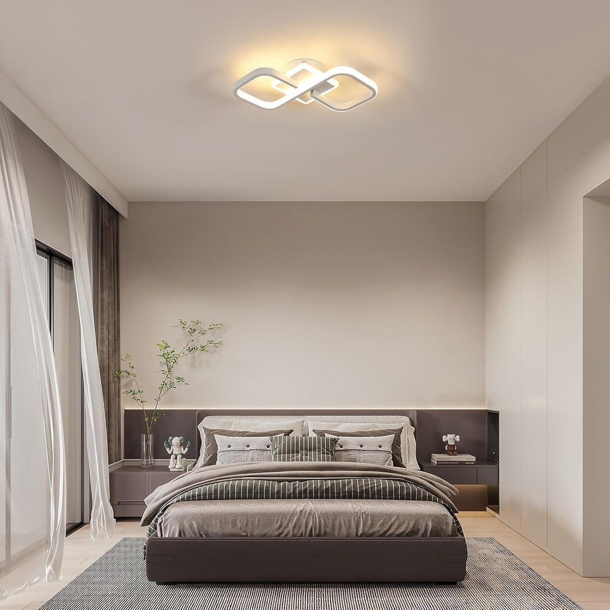 Quadria — Plafonnier blanc installé dans une chambre, vue de face.