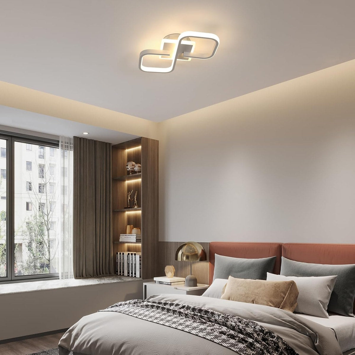 Quadria — Plafonnier blanc installé dans une chambre, vue en biais.