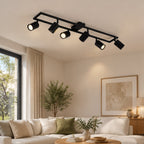 Spot pour plafond Lindby Bravius, noir, à 6 lampes, fer — salon — mise en scène illustrative 1