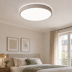 Plafonnier LED Lindby Zylo, taupe, Ø 49 cm, CCT à intensité variable — chambre — mise en scène illustrative 2