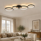 Lindby Plafonnier LED Evengeline, noir, aluminium, 88 cm — salon — mise en scène illustrative 1