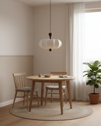 Suspension Nolune au-dessus d une table à manger lumineuse