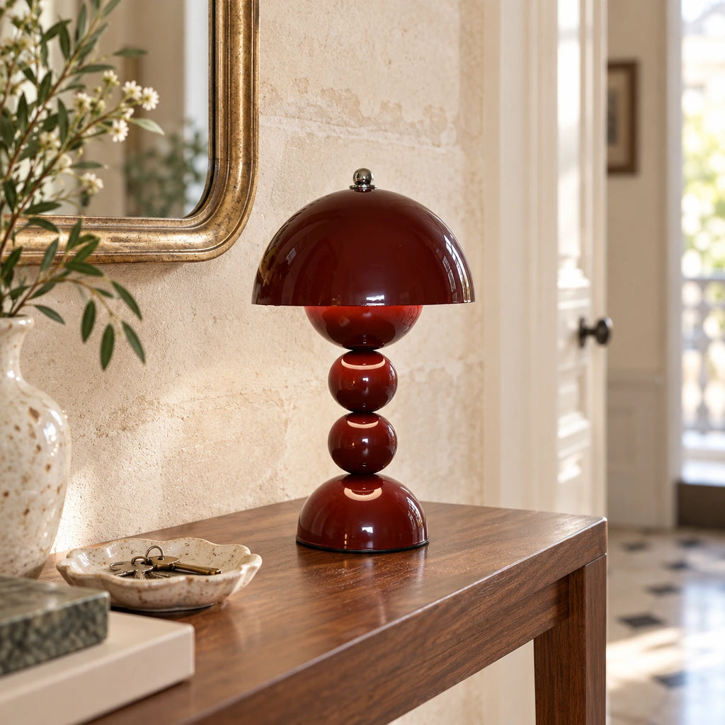 Perlina bordeaux sur une console d’entrée