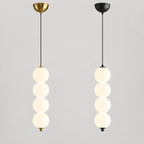 Comparaison des finitions Noir et Doré — une suspension par achat