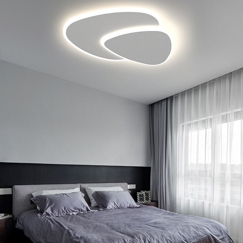 Plafonnier Zeno installé dans une chambre